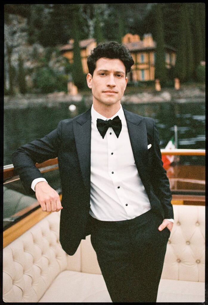 Groom portrait captured in an editorial style during a Lake Garda elopement boat photo shoot