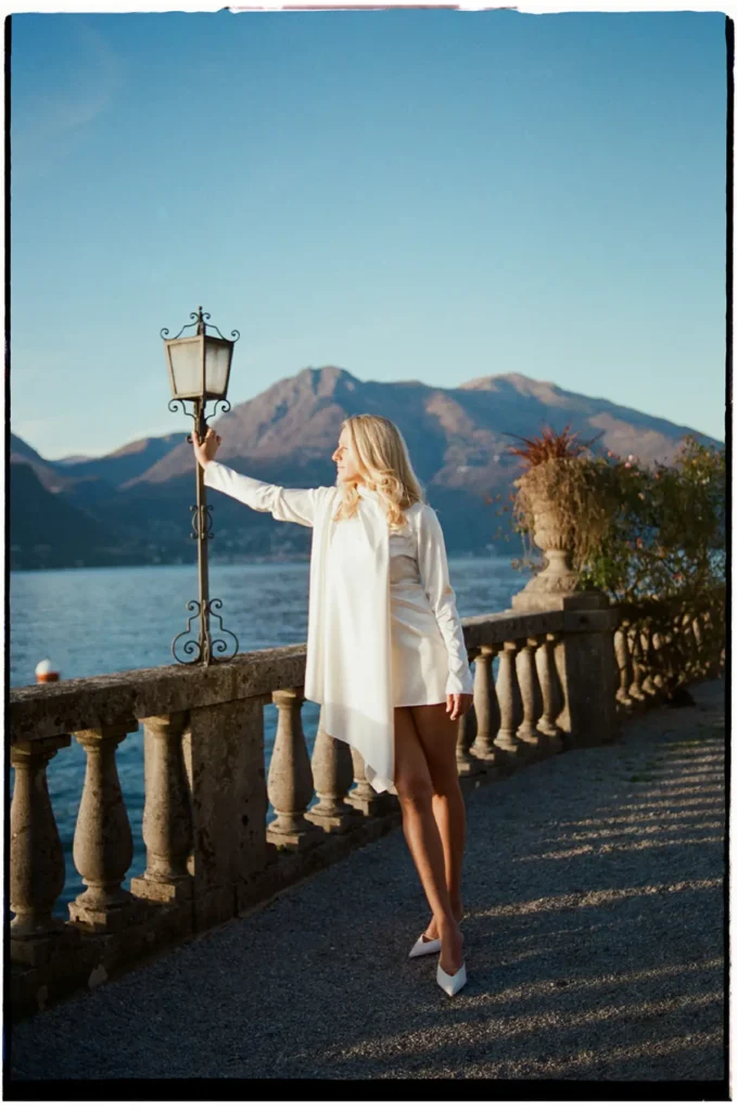 Editorial portrait on the lakeside promenade at Villa Serbelloni Bellagio in warm afternoon light, Lake Como