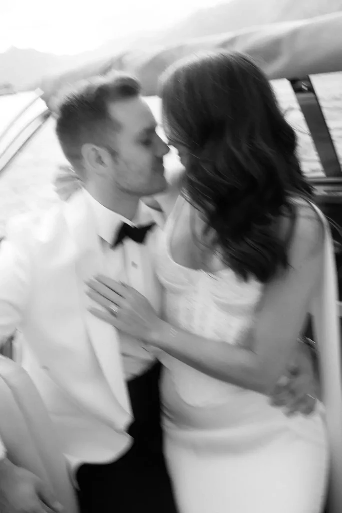 Cinematic couple kiss at Villa Balbiano, intimate Lake Como wedding - blurry editorial shot